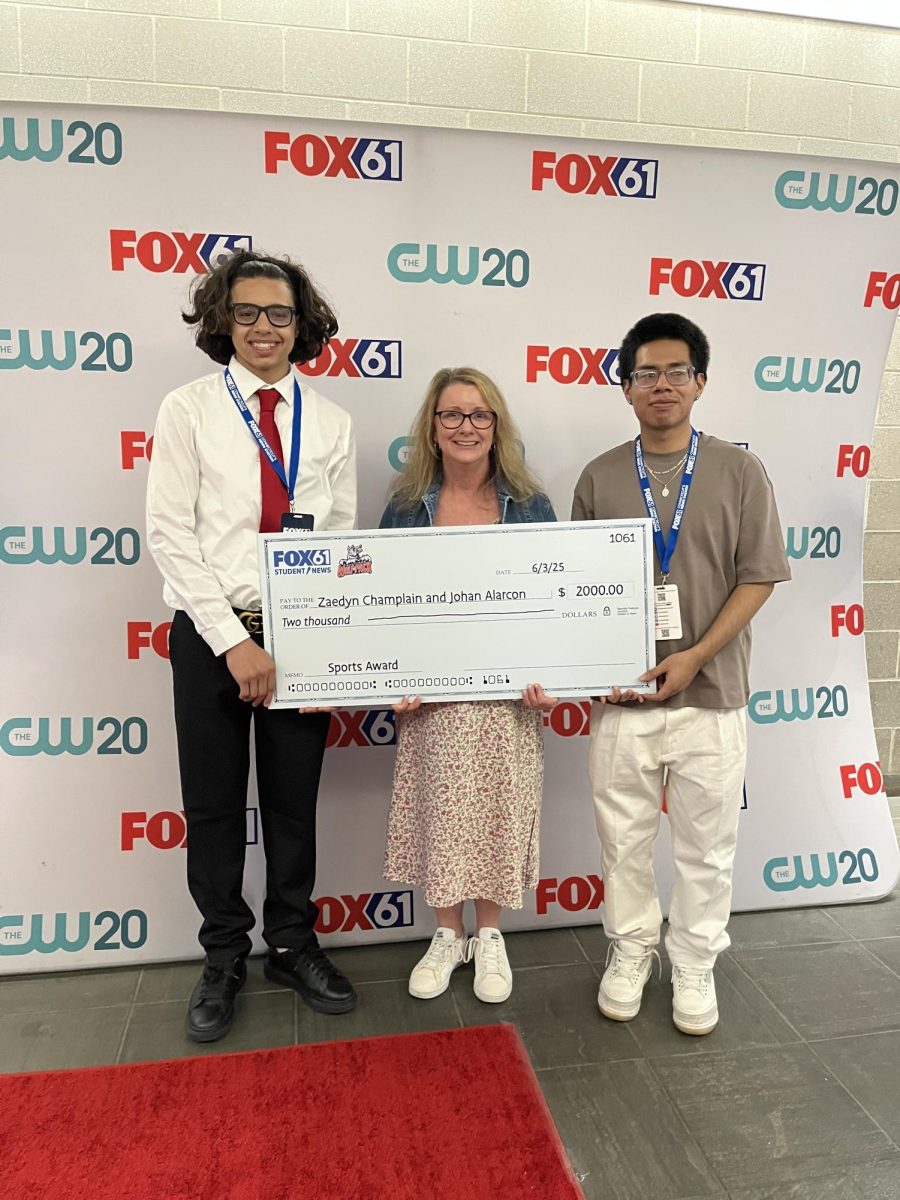 Zaedyn Champlain, '26, Mrs. Fitzgerald, Digital Media Teacher, and Johan Alarcon, '25 attended the Fox 61 Student News Awards at the University of Hartford.